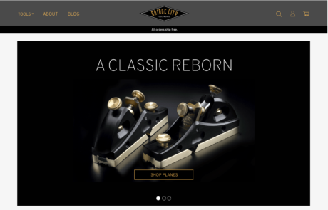 A black and gold website with a classic reborn logo.