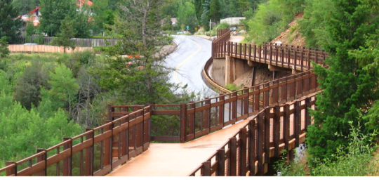 Otak website design showing a bridge walkway.